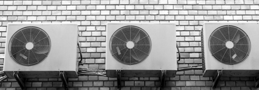 thre ac units on a wall