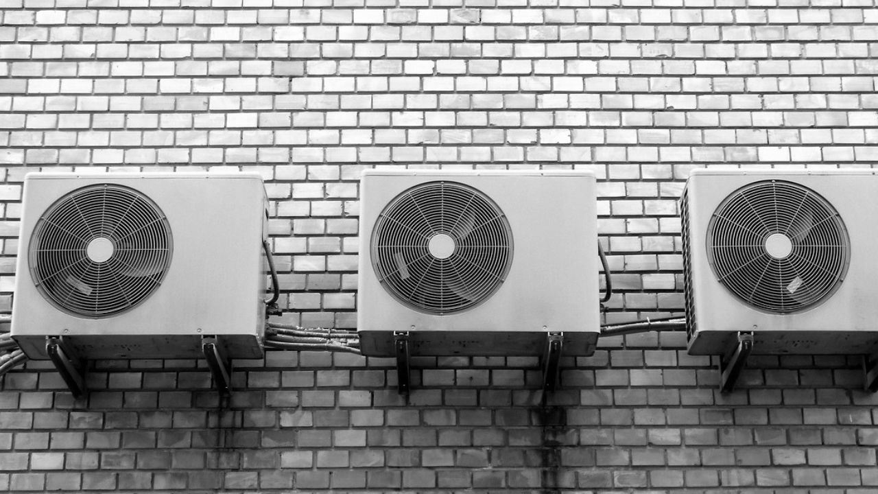 thre ac units on a wall